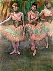 Dancers wearing salmon coloured skirts by Edgar Degas